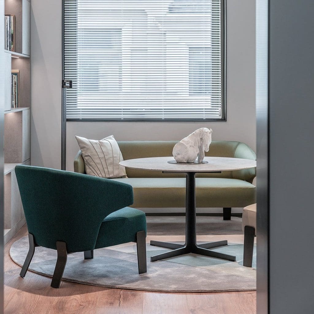 Camerich Embrace chairs at cafe tables in a daylit room